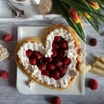 Marzipan meringue berry cake in heart shape – for loved ones