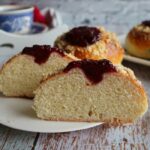 Sweet buns with jam and crumbs